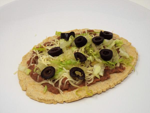 Huaraches with Black Olives and Monterey Jack Cheese
