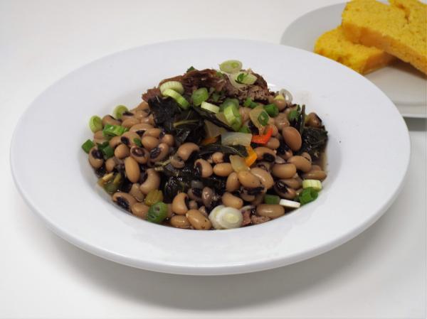 Braised Pork with Black Eyed Peas and Greens